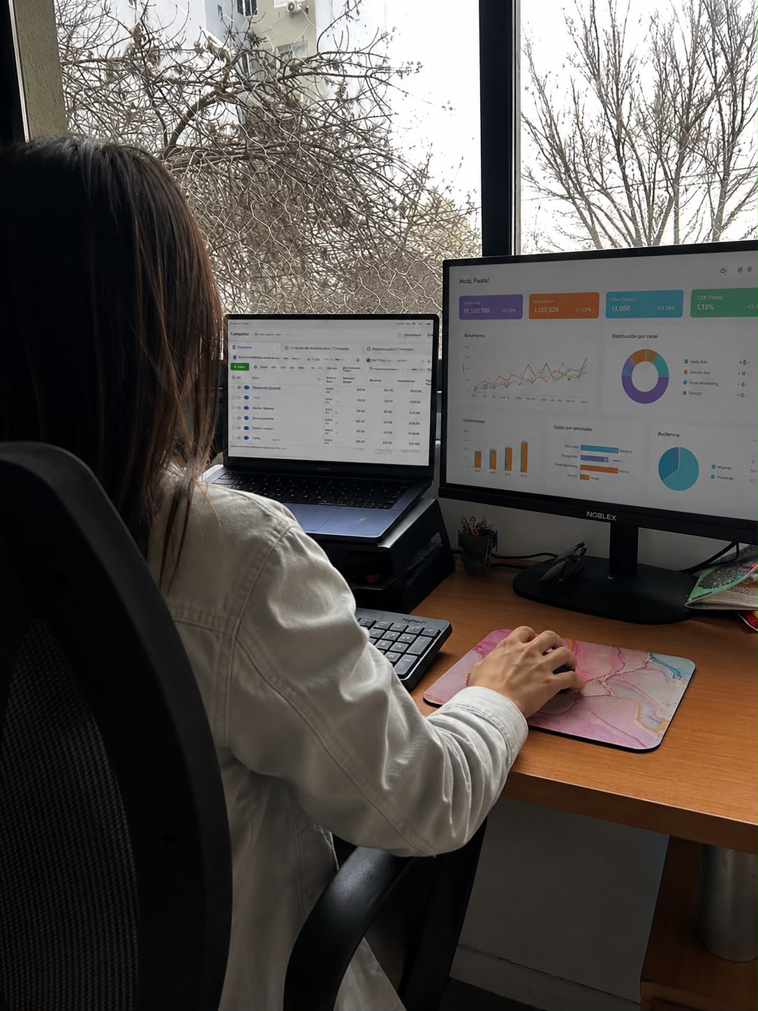 Paula working at her desk